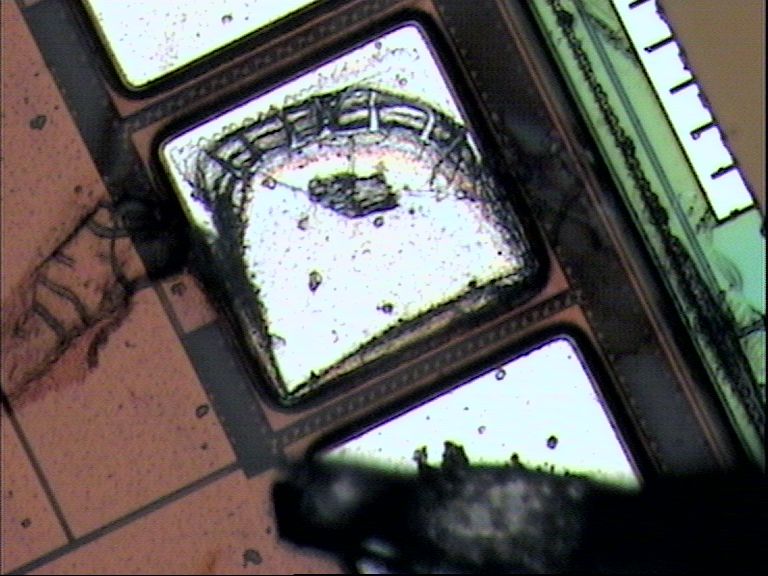 Close-up of bond pad near discolored area.